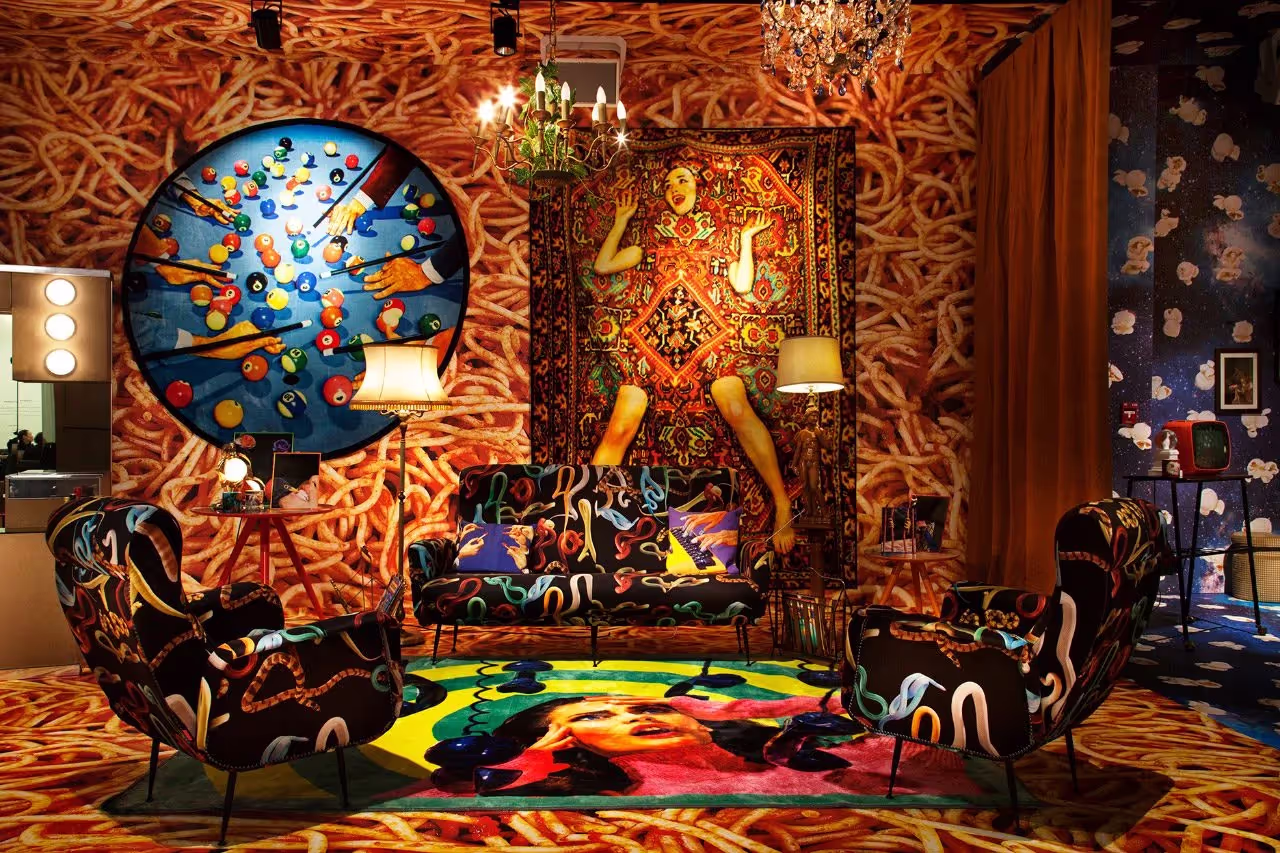 Surreal spaghetti-themed room with bold art and eclectic furniture.