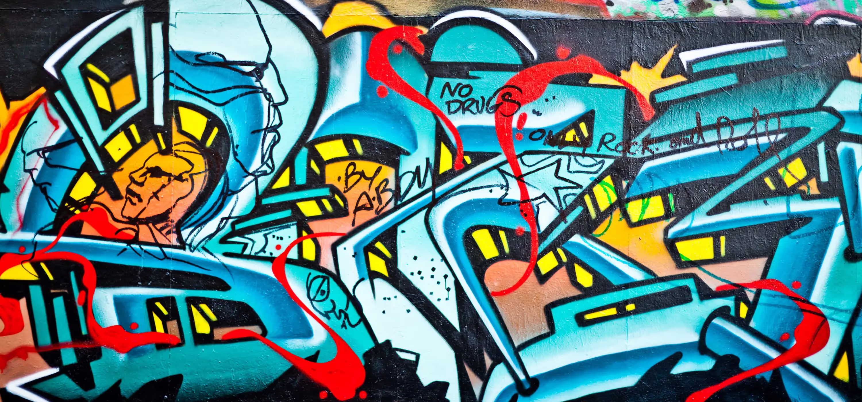 Vibrant graffiti art with bold lines, abstract figures, and a message against drugs.