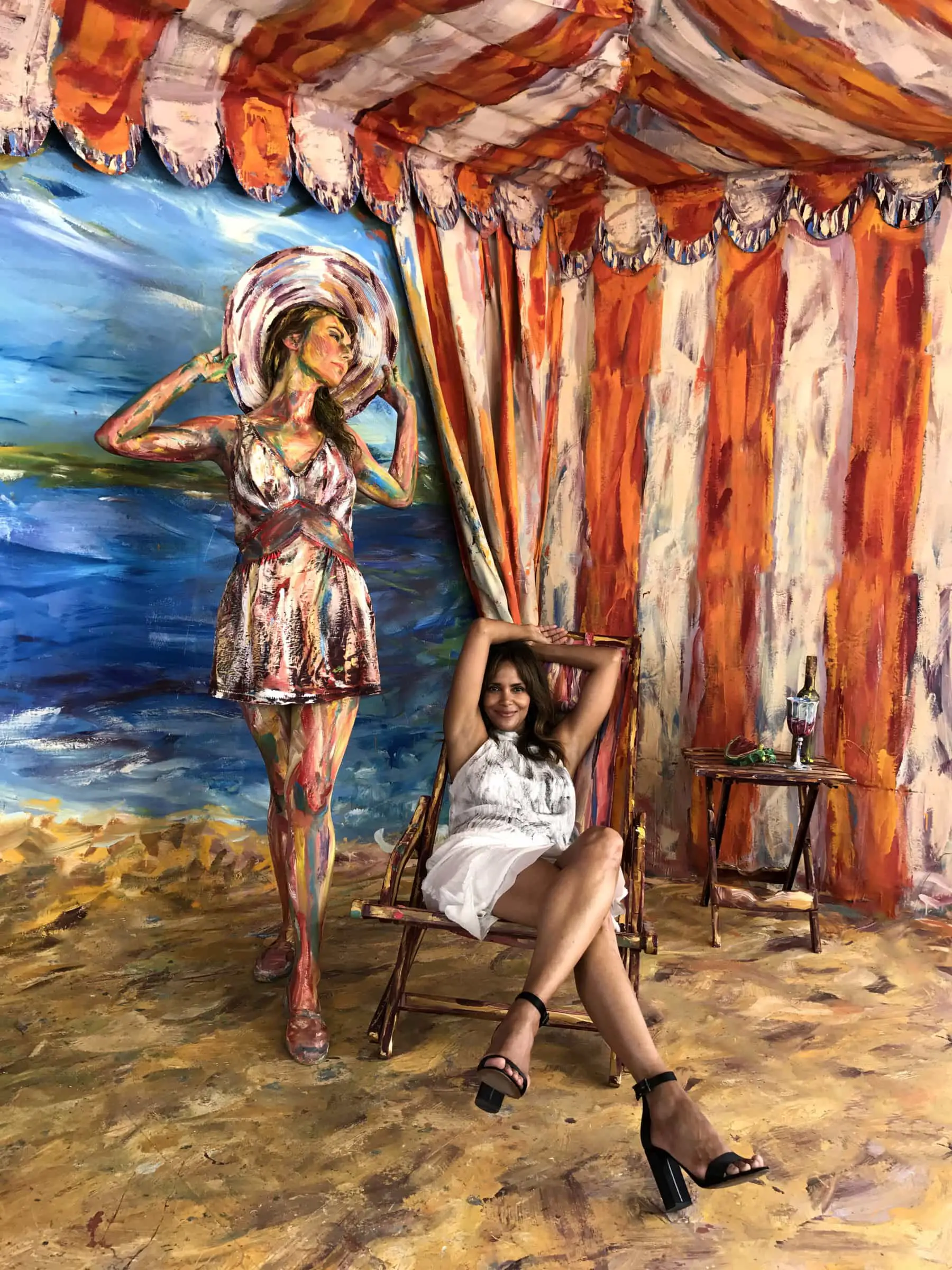 Impressionist oil painting of women at a beach tent, vibrant colors, playful mood.